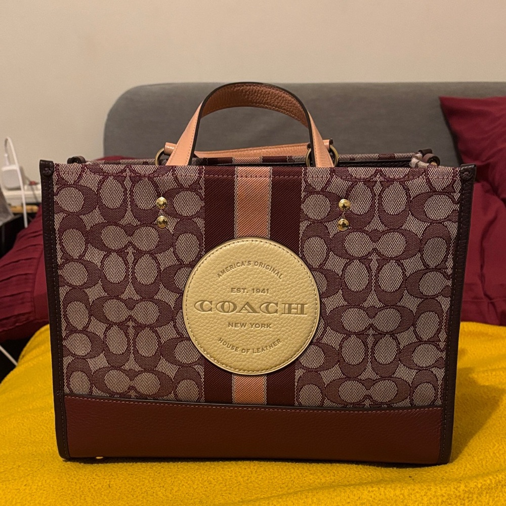 124 - COACH Dempsey Carry-all in Signature Jacquard Handbag (Wine Multi)